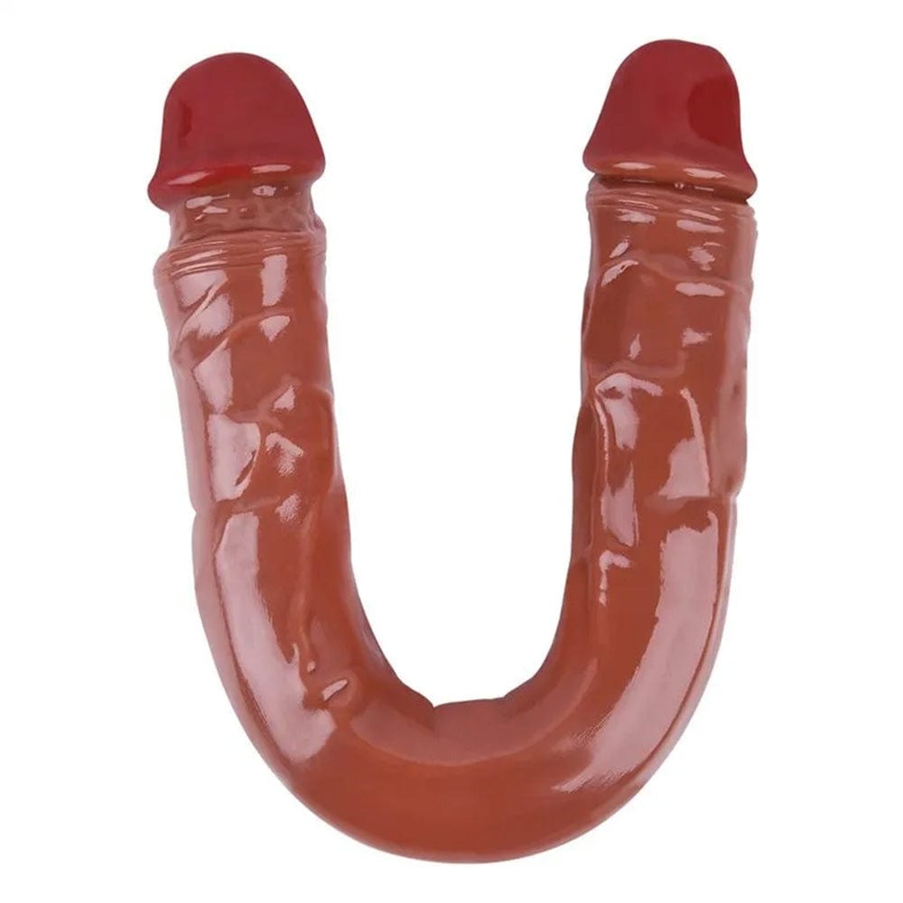 15.55-inch dildo displayed next to measurement tape showing full length
