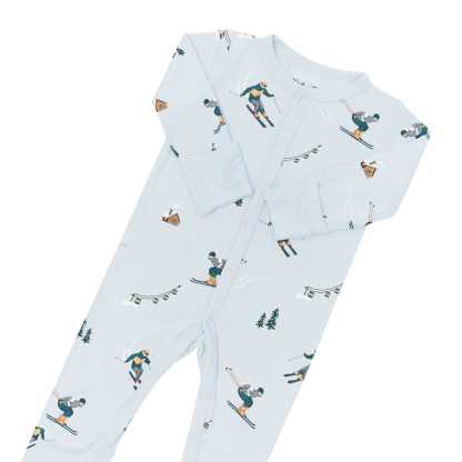 The snap closures and fold over hand cuffs shown on the Romper in Ski