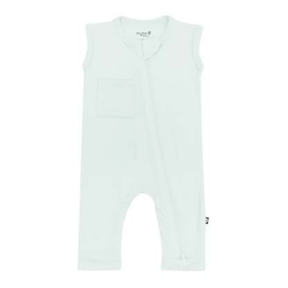Kyte Baby's Zippered Sleeveless Romper in Dew showing front pocket and zippered closure