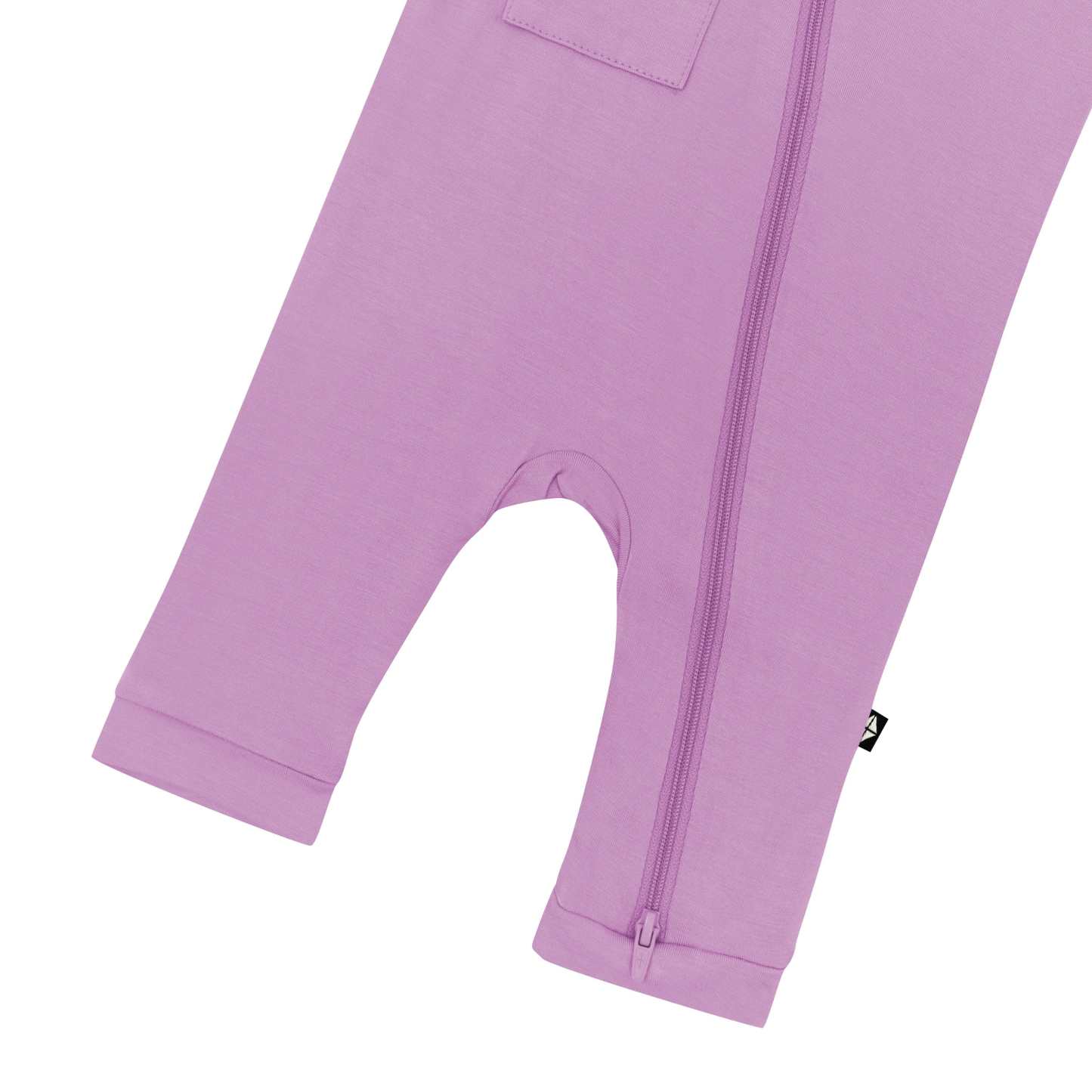 Capri length Kyte Baby Sleeveless Zippered Romper in Poi