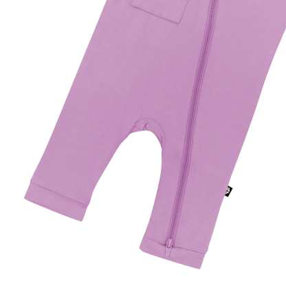 Capri length Kyte Baby Sleeveless Zippered Romper in Poi