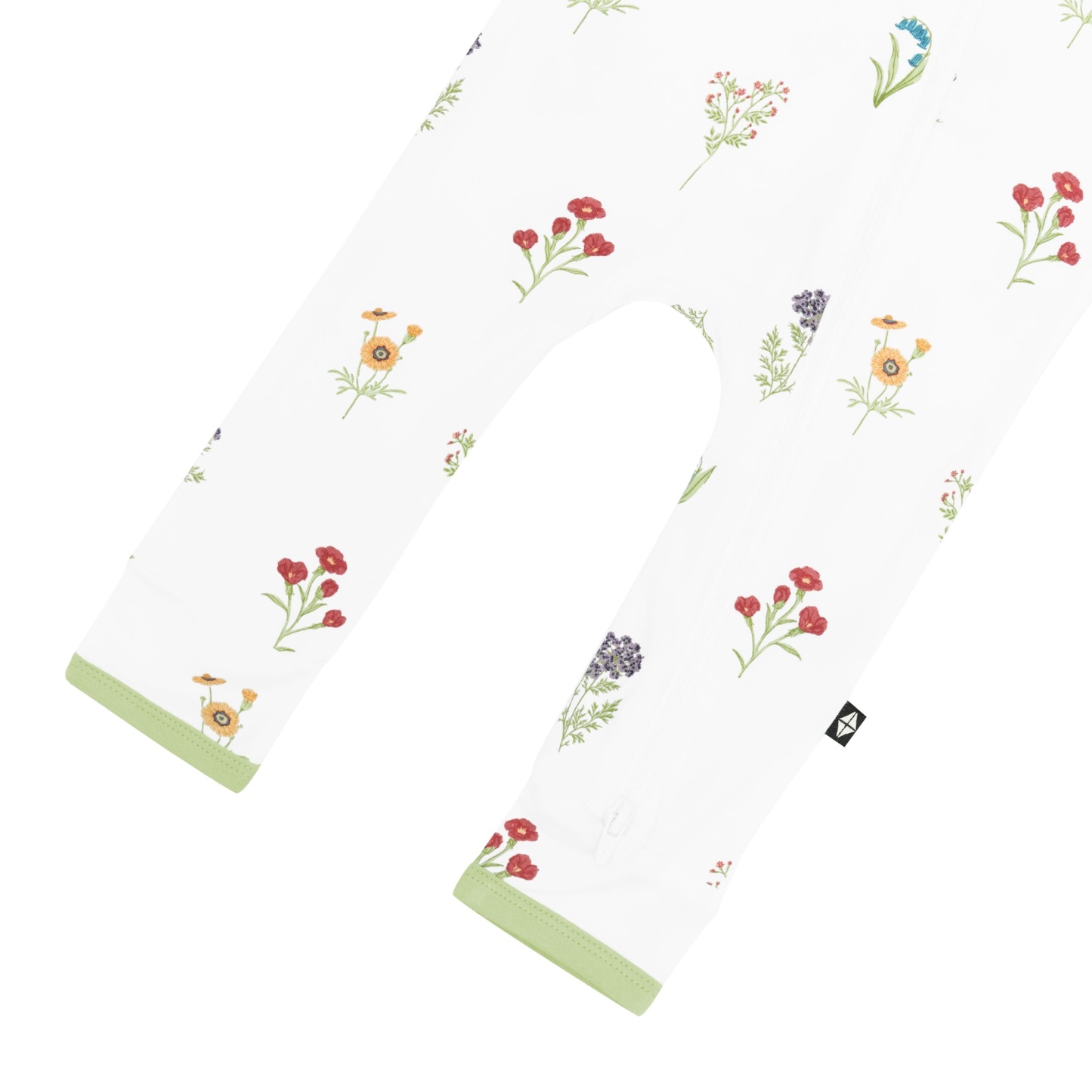 Zippered Romper in Wildflower close up on feet holes