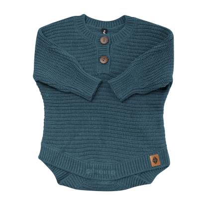 Chunky Knit Romper in Atlantic shown with the arms folded inwards