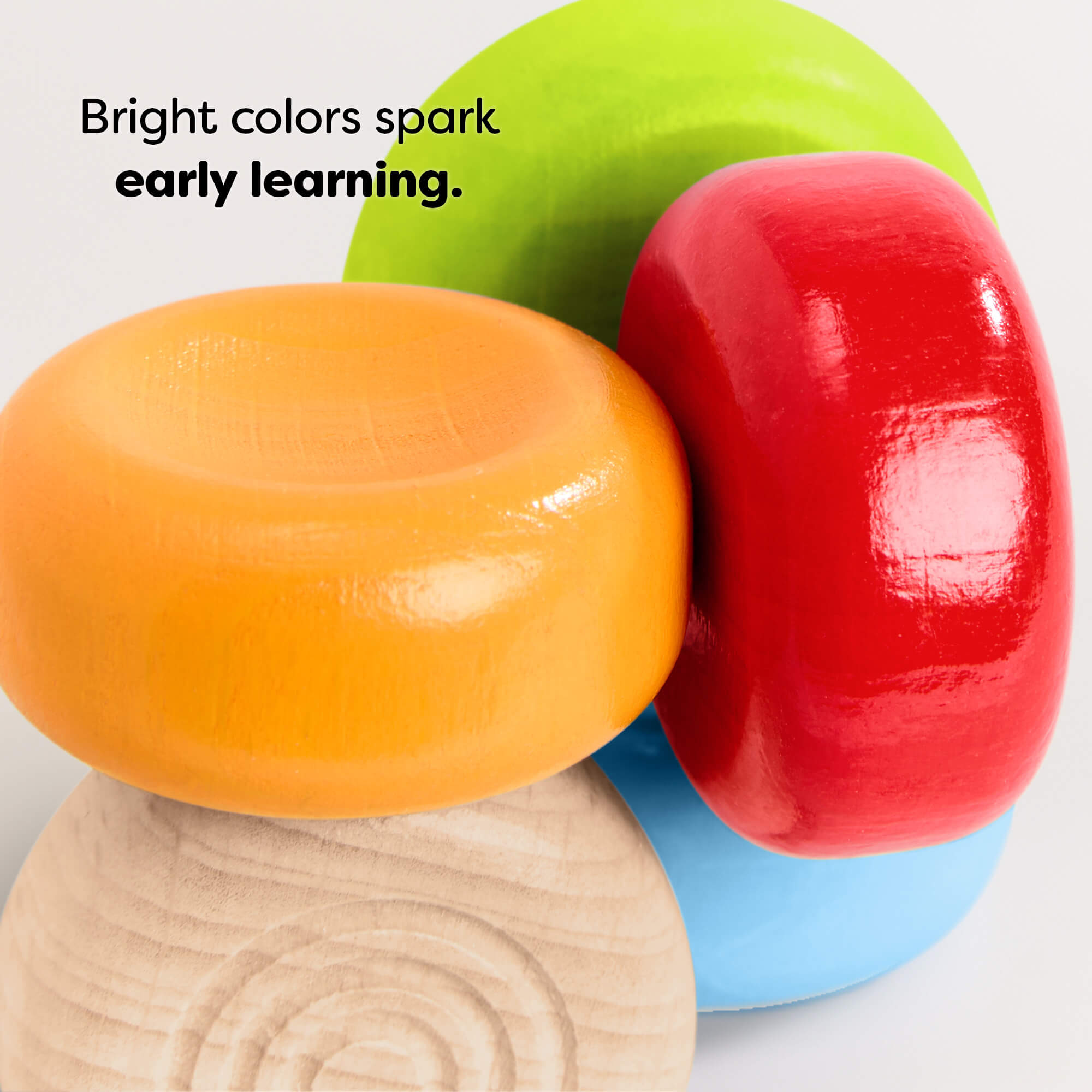 HABA Color Drops Wooden Grasping and Teething Toy with text 'Bright colors spark early learning.'