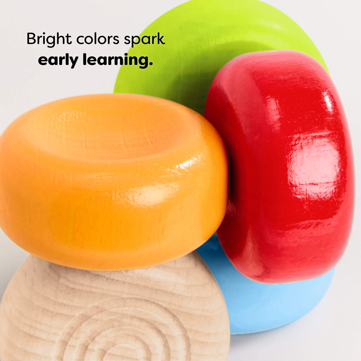 HABA Color Drops Wooden Grasping and Teething Toy with text 'Bright colors spark early learning.'