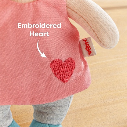 Pink dress has an embroidered heart