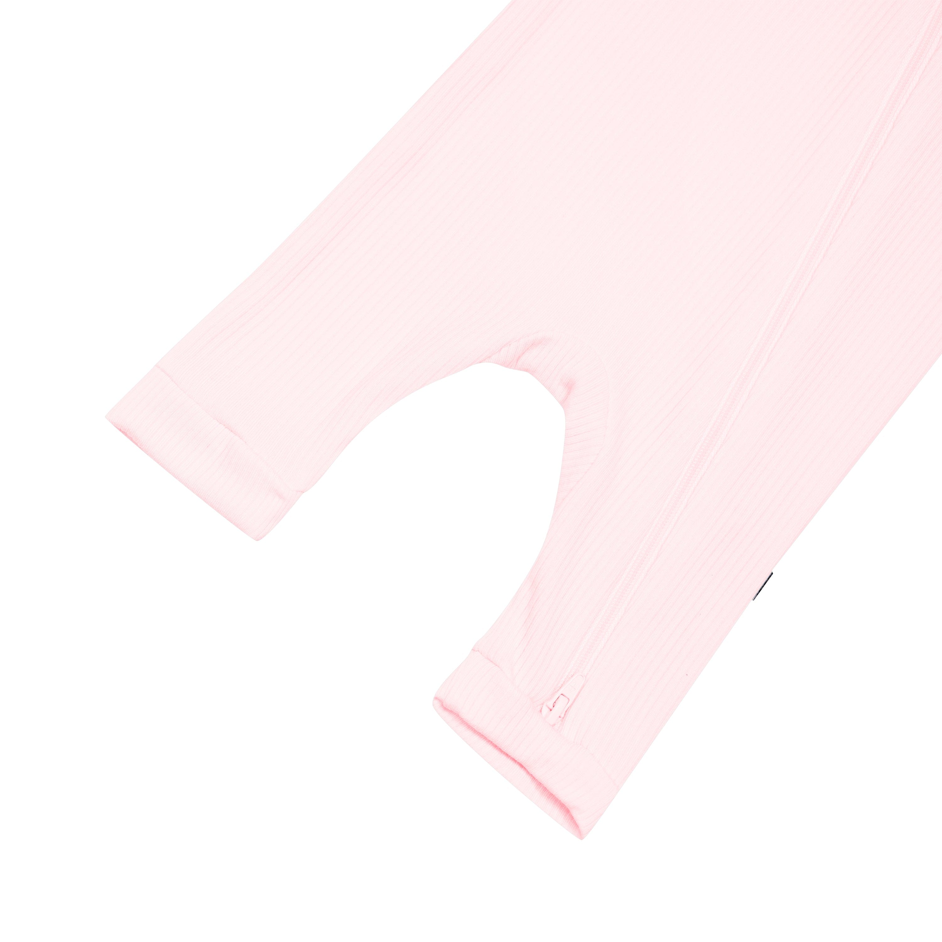 Double zipper on Kyte Baby Ribbed Zippered Sleeveless Romper in Sakura