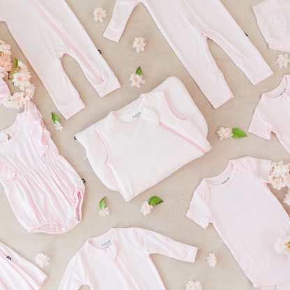 Kyte Baby bamboo clothing and sleep bags in Sakura pink