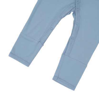 Close up of snaps on legs of Kyte Baby Romper in Slate