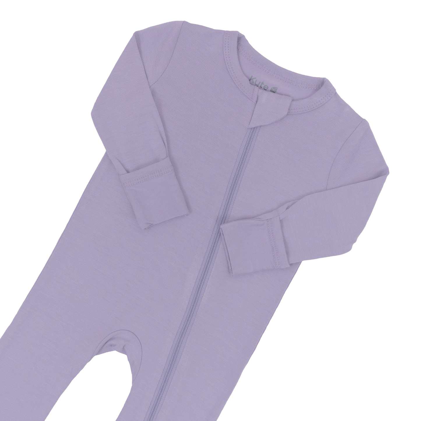 Close up of zipper garage and fold-over cuffs on zippered romper in Taro