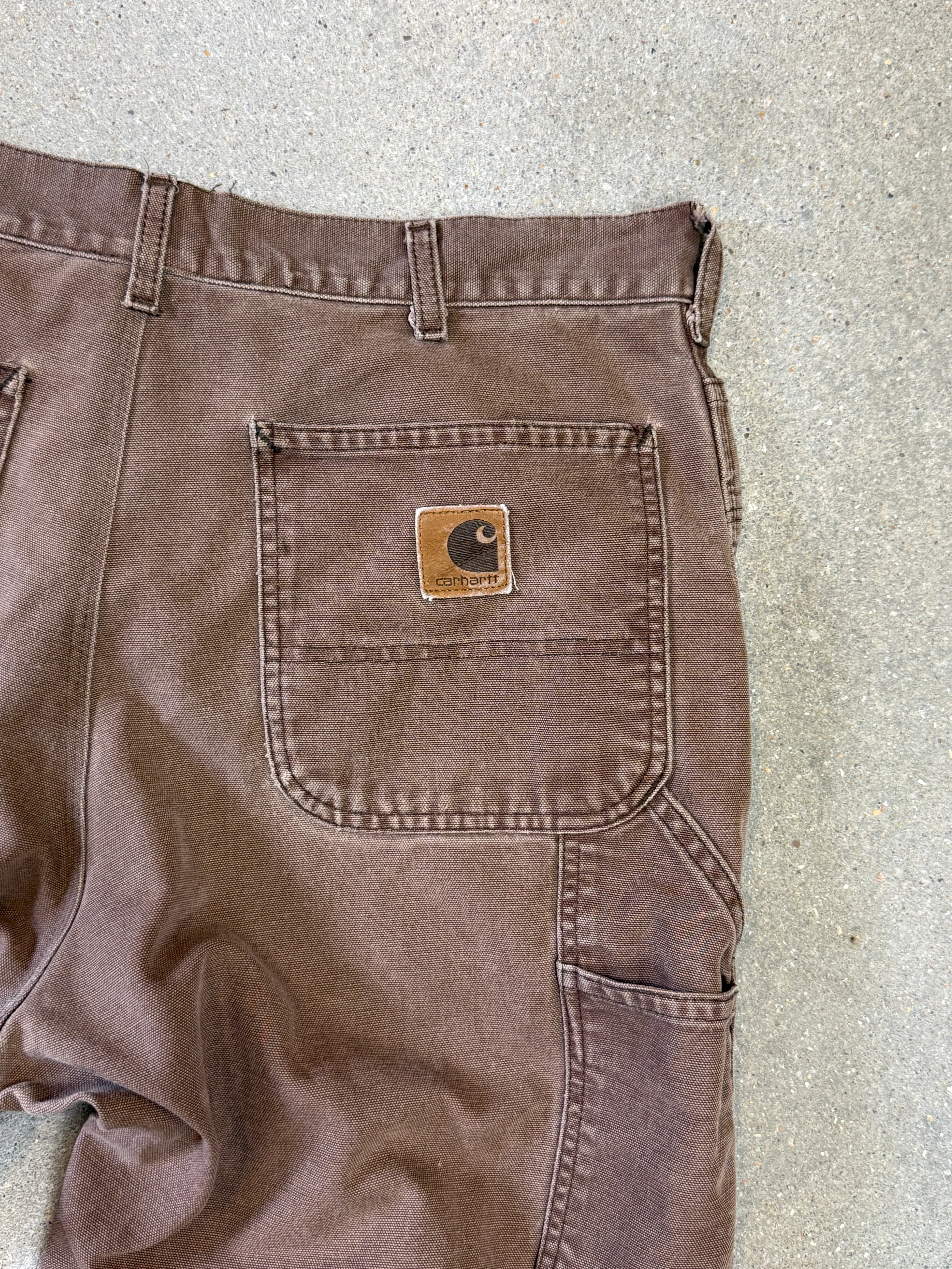1990s Carhartt Baggy/Wide leg Cargo worker Pants in faded brown canvas. Size W34"L34 (fits W33"L34)