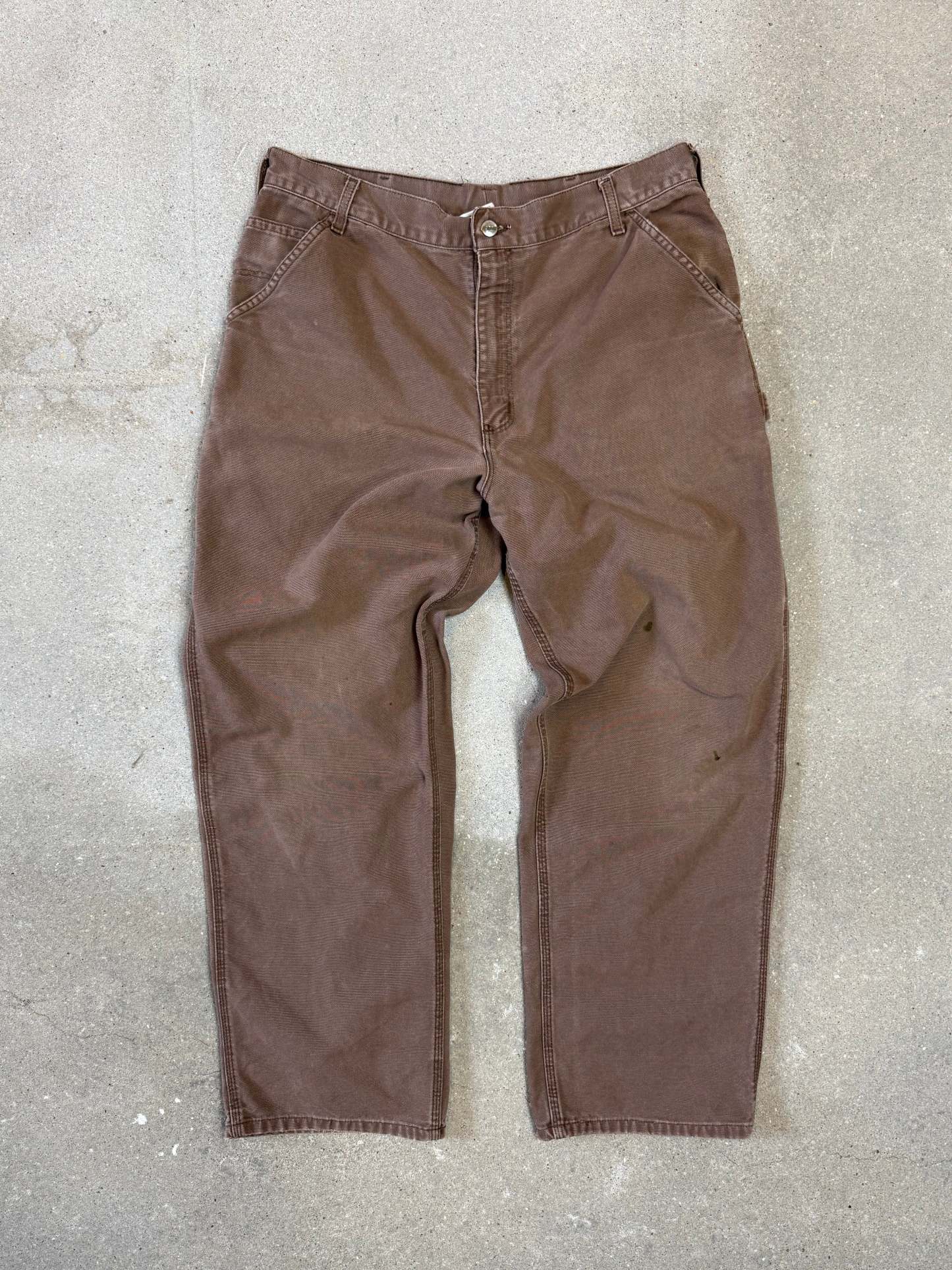 1990s Carhartt Baggy/Wide leg Cargo worker Pants in faded brown canvas. Size W34"L34 (fits W33"L34)