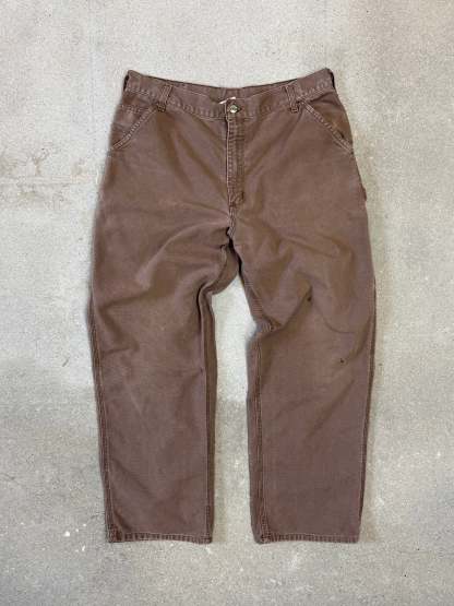 1990s Carhartt Baggy/Wide leg Cargo worker Pants in faded brown canvas. Size W34"L34 (fits W33"L34)