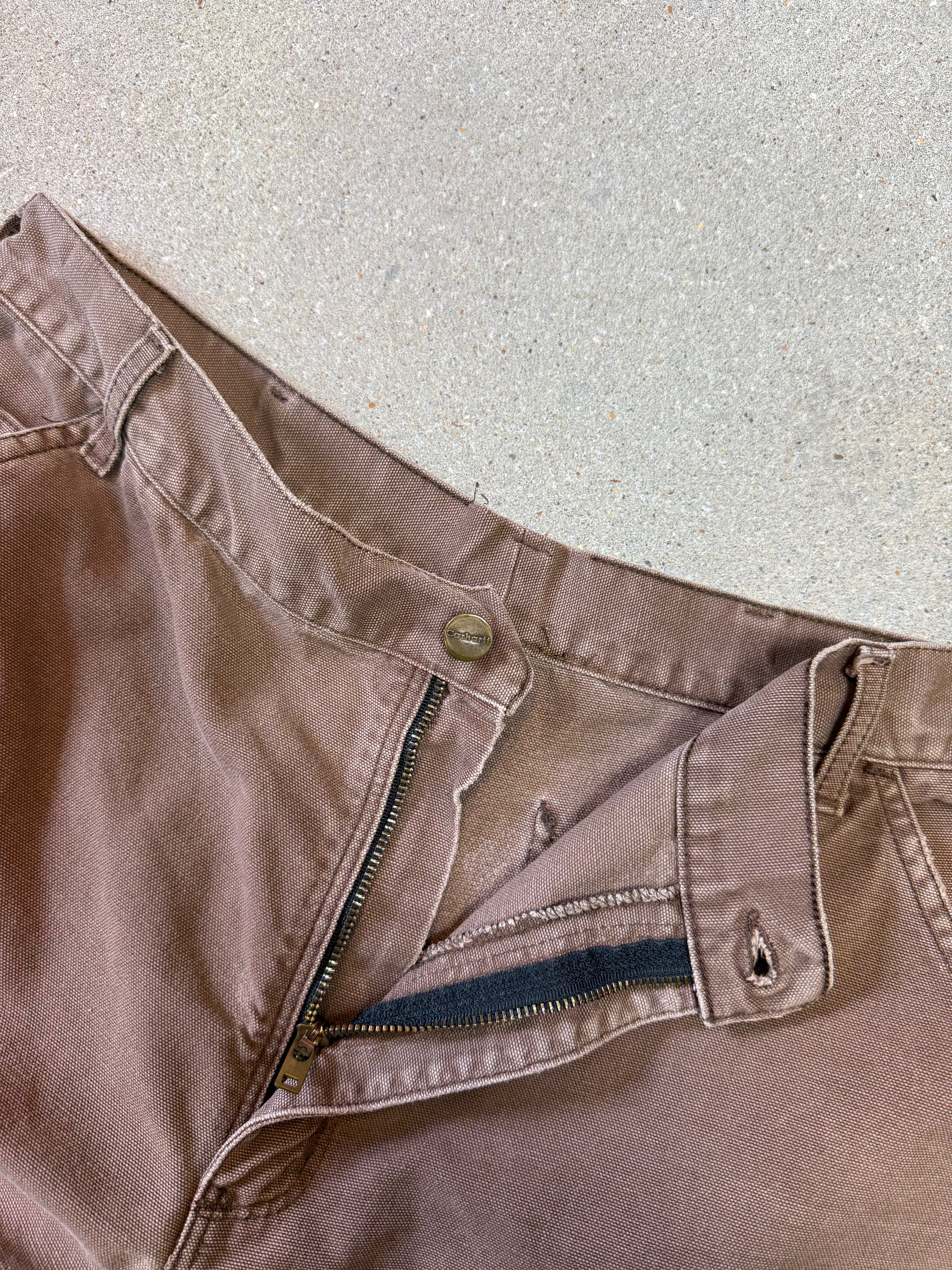 1990s Carhartt Baggy/Wide leg Cargo worker Pants in faded brown canvas. Size W34"L34 (fits W33"L34)