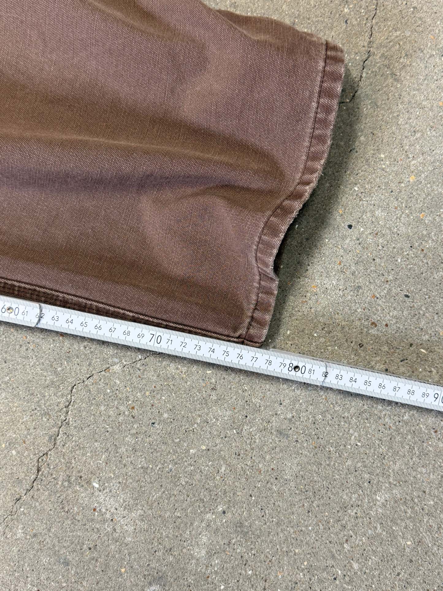 1990s Carhartt Baggy/Wide leg Cargo worker Pants in faded brown canvas. Size W34"L34 (fits W33"L34)