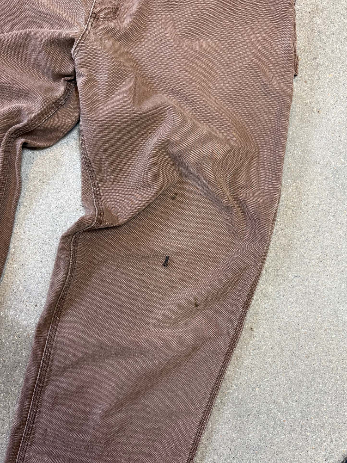 1990s Carhartt Baggy/Wide leg Cargo worker Pants in faded brown canvas. Size W34"L34 (fits W33"L34)