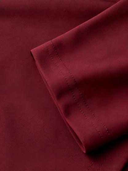 Red square-collared metal-buttoned jumpsuit Belted mid-sleeve irregular shorts