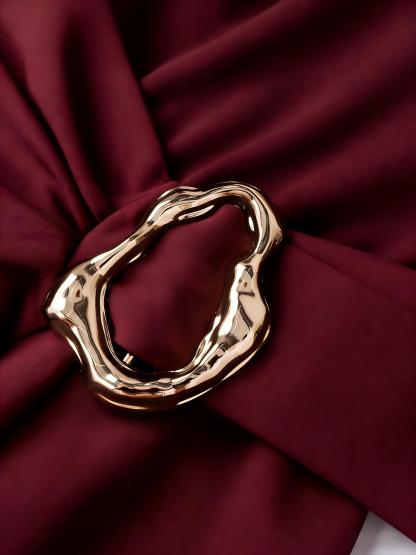 Red square-collared metal-buttoned jumpsuit Belted mid-sleeve irregular shorts