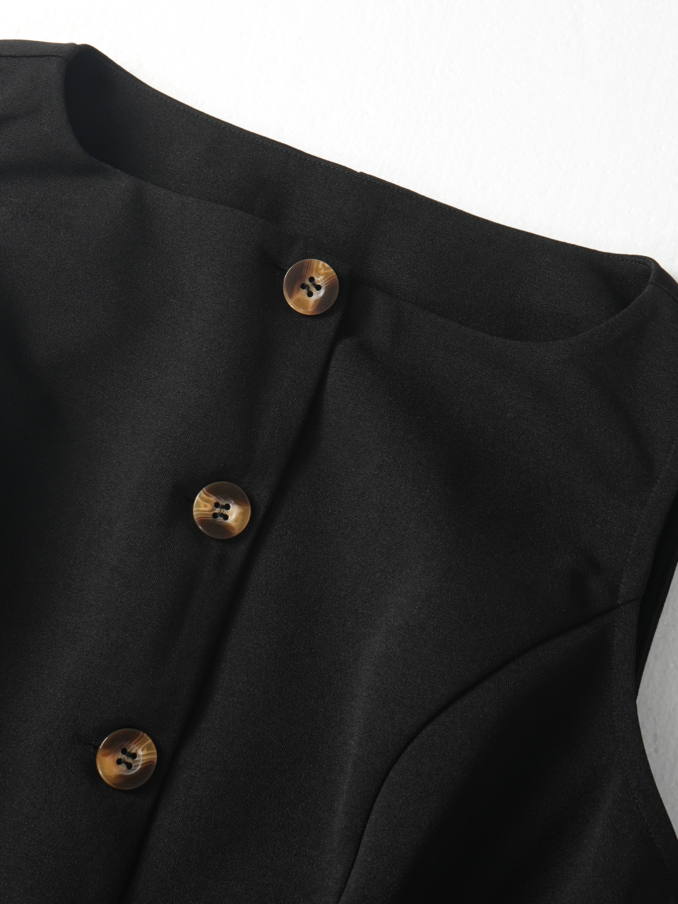 Woman's Black Sleeveless Button-Front Peplum Waistcoat