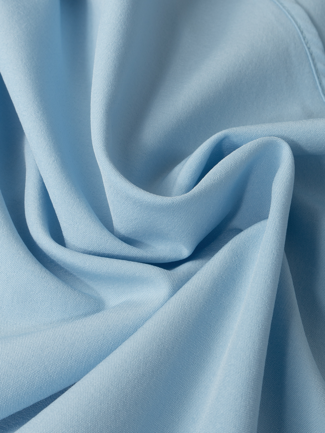 Woman's Light Blue Wrap Blouse with Ruffled Waist, Puff Sleeves and Side Buttons-Aegean-sea