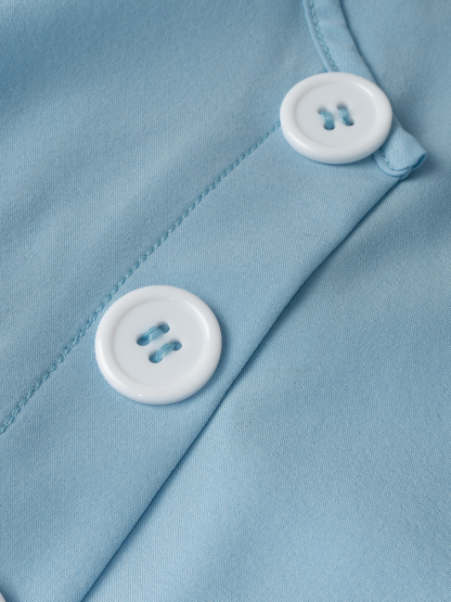 Woman's Light Blue Wrap Blouse with Ruffled Waist, Puff Sleeves and Side Buttons-Aegean-sea