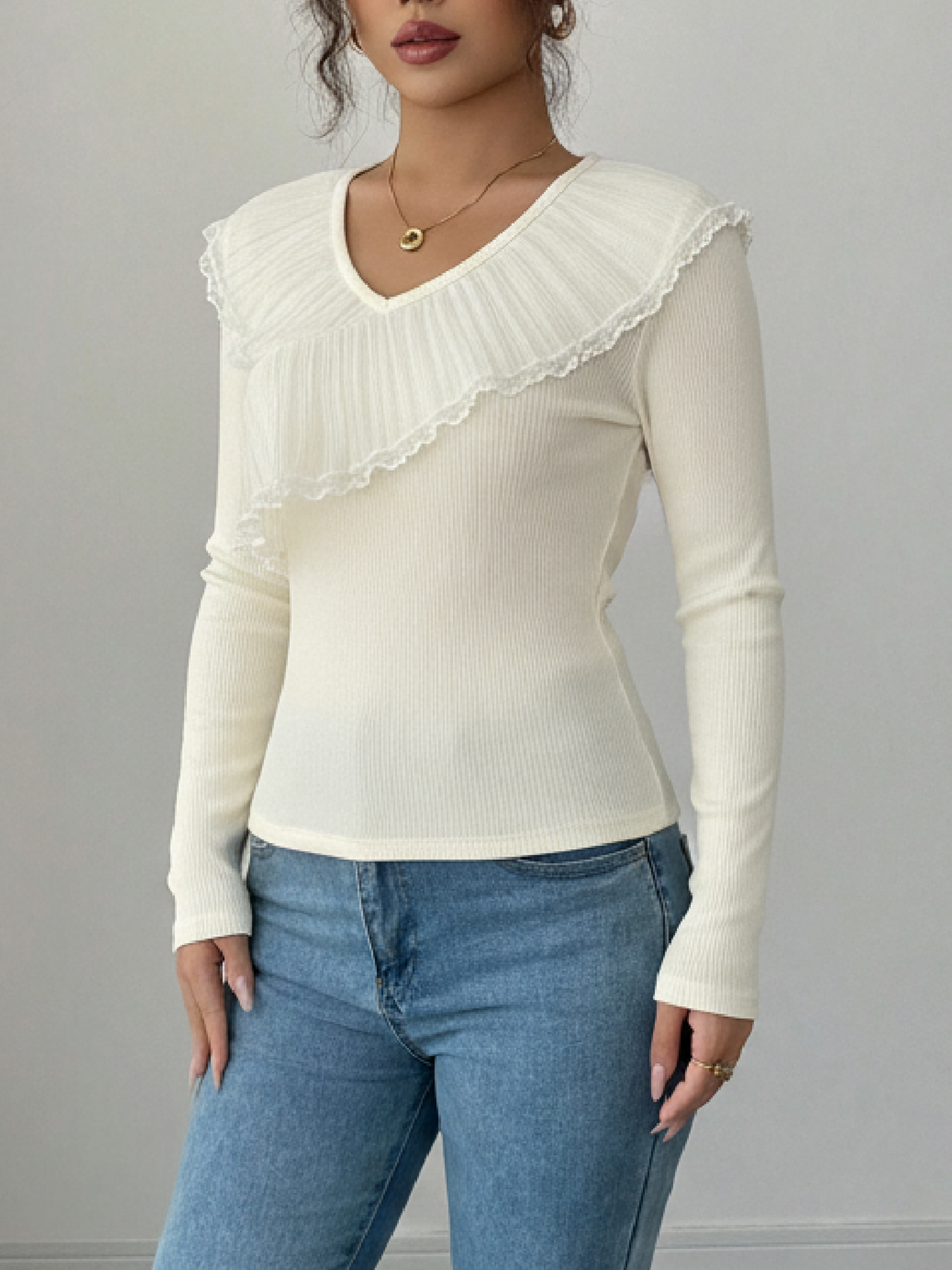 Women's Cream V-Neck Long Sleeve Top with Asymmetric Ruffle Lace Trim and Ribbed Detail