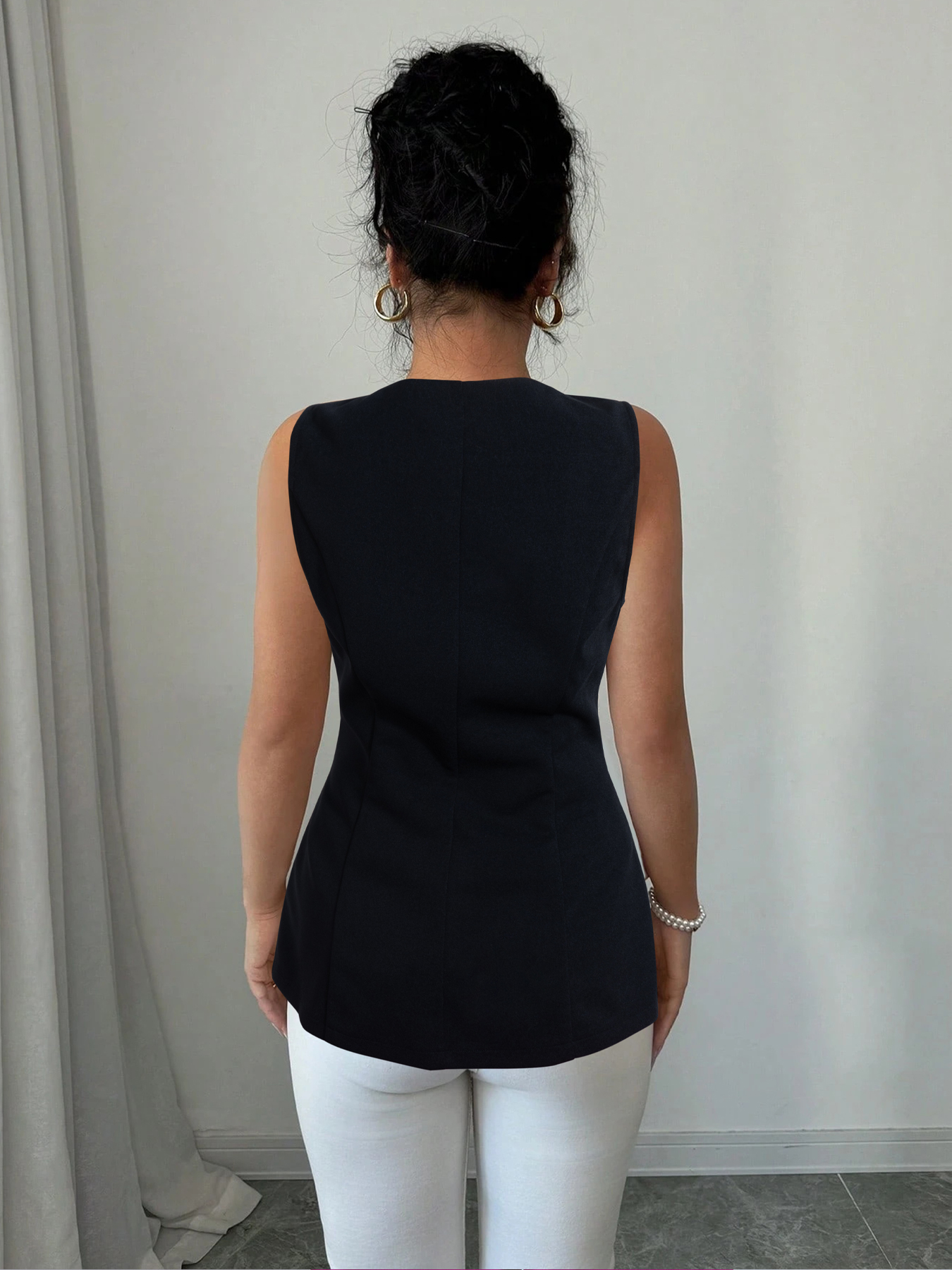 Woman's Black Sleeveless Button-Front Peplum Waistcoat