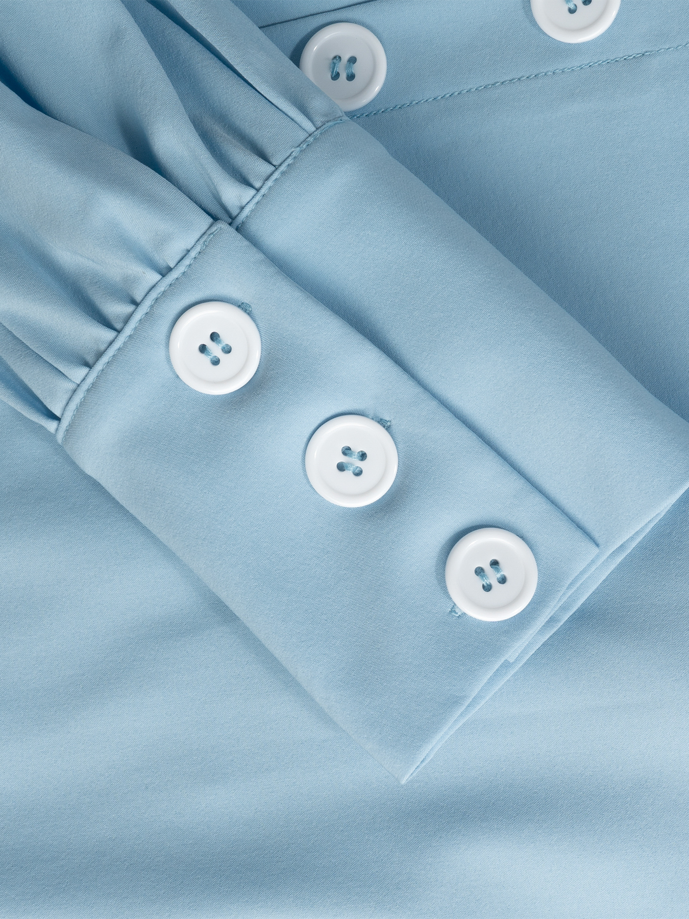 Woman's Light Blue Wrap Blouse with Ruffled Waist, Puff Sleeves and Side Buttons-Aegean-sea