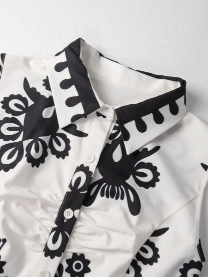 Woman's Vintage Vacation Style Black & White Print Dress: Sleeveless Shirt Collar Waist-Fitted Tie-Waist Mini Dress