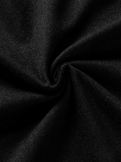 Woman's Black spaghetti strap mini dress with ruffled neckline and bow embellishment.