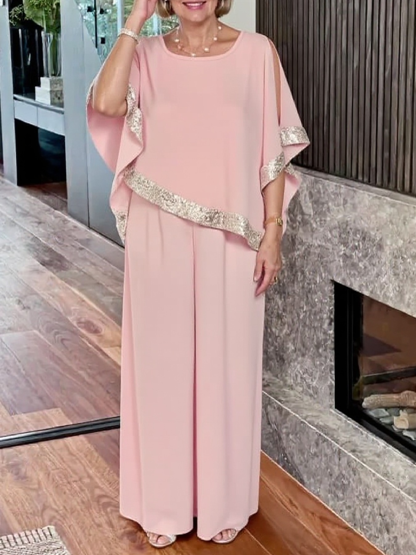 Woman in Pink Gold-Stitched Cloak-style Top and Wide-Legs Suit