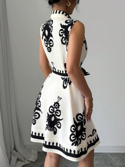 Woman's Vintage Vacation Style Black & White Print Dress: Sleeveless Shirt Collar Waist-Fitted Tie-Waist Mini Dress