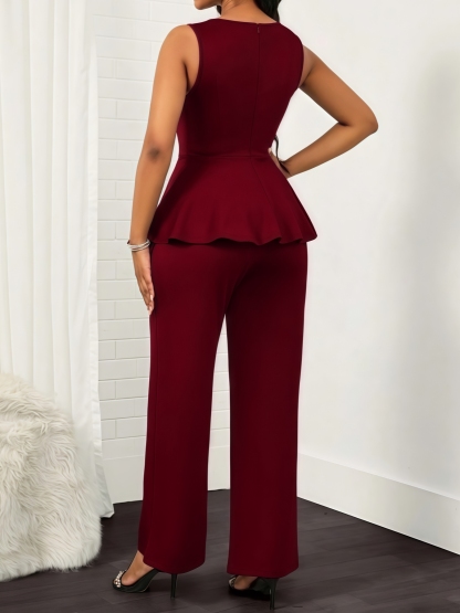 Woman's Red sleeveless two-piece suit with V-neck, frilly hem and wide legs.