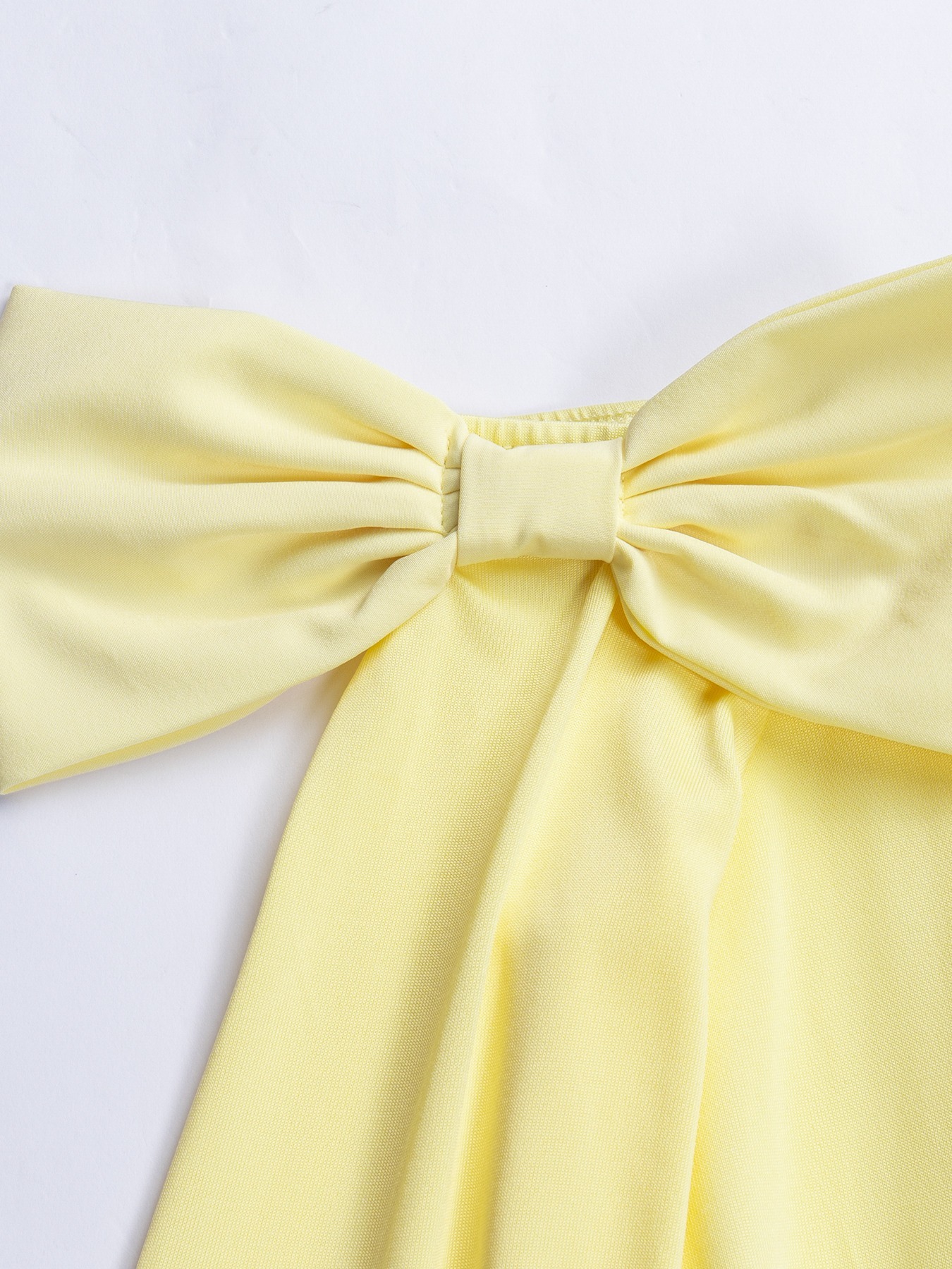 Yellow single-shoulder butterfly-tied dress Long-sleeved, waist-length, wide-waisted dress