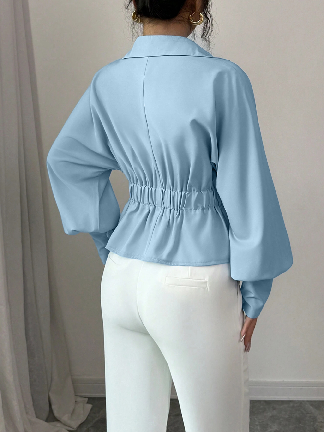 Woman's Light Blue Wrap Blouse with Ruffled Waist, Puff Sleeves and Side Buttons-Aegean-sea