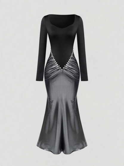 Black-and-silver pearl-stitched dress. Long skirt with square neck and long sleeves, tight and shiny. Sexy dress for dinner parties.-Aegean-sea