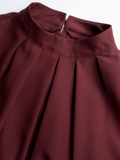 Woman's High Neck Puff Sleeve Peplum Top with Smocked Waist