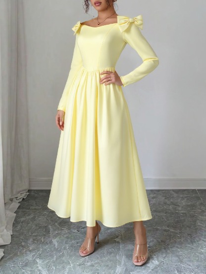 Yellow single-shoulder butterfly-tied dress Long-sleeved, waist-length, wide-waisted dress