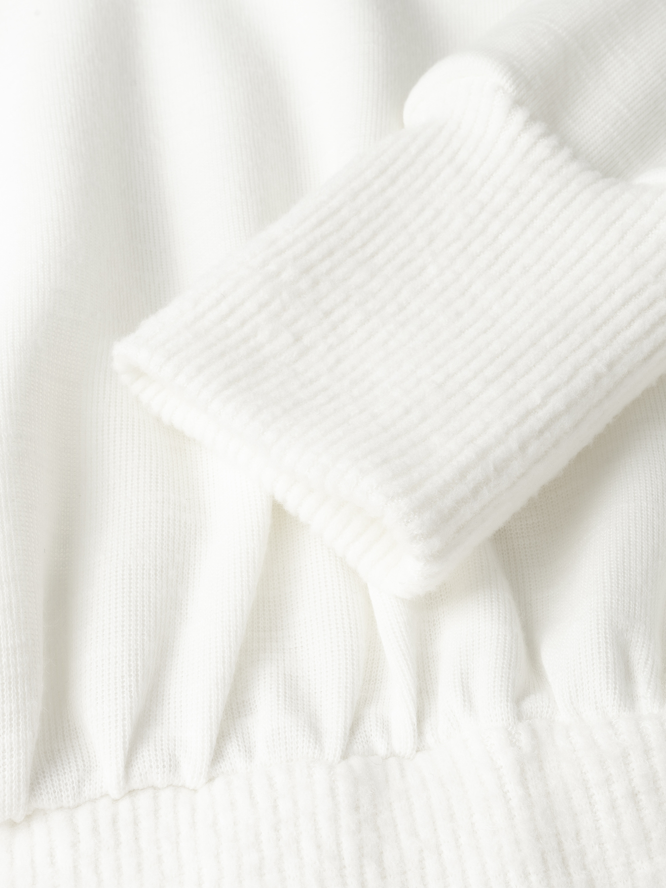 White Off-The-Shoulder Long Sleeve Knit Top with Ribbed Waist