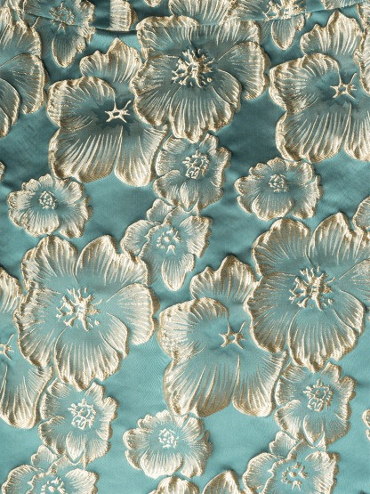 Women in flowered, bubble-sleeved, fish-tail dresses with waist-shrouding, hip-shrouding mid-skirts