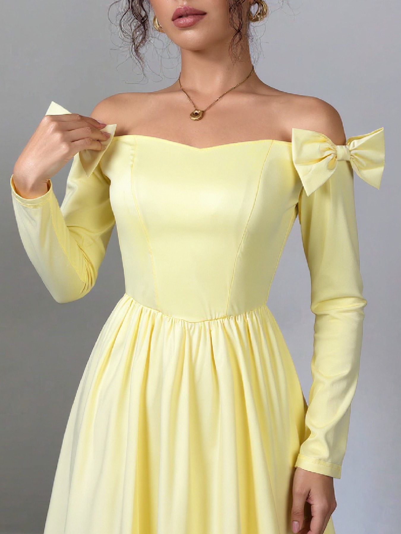 Yellow single-shoulder butterfly-tied dress Long-sleeved, waist-length, wide-waisted dress