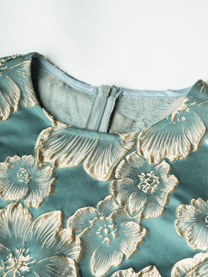 Women in flowered, bubble-sleeved, fish-tail dresses with waist-shrouding, hip-shrouding mid-skirts