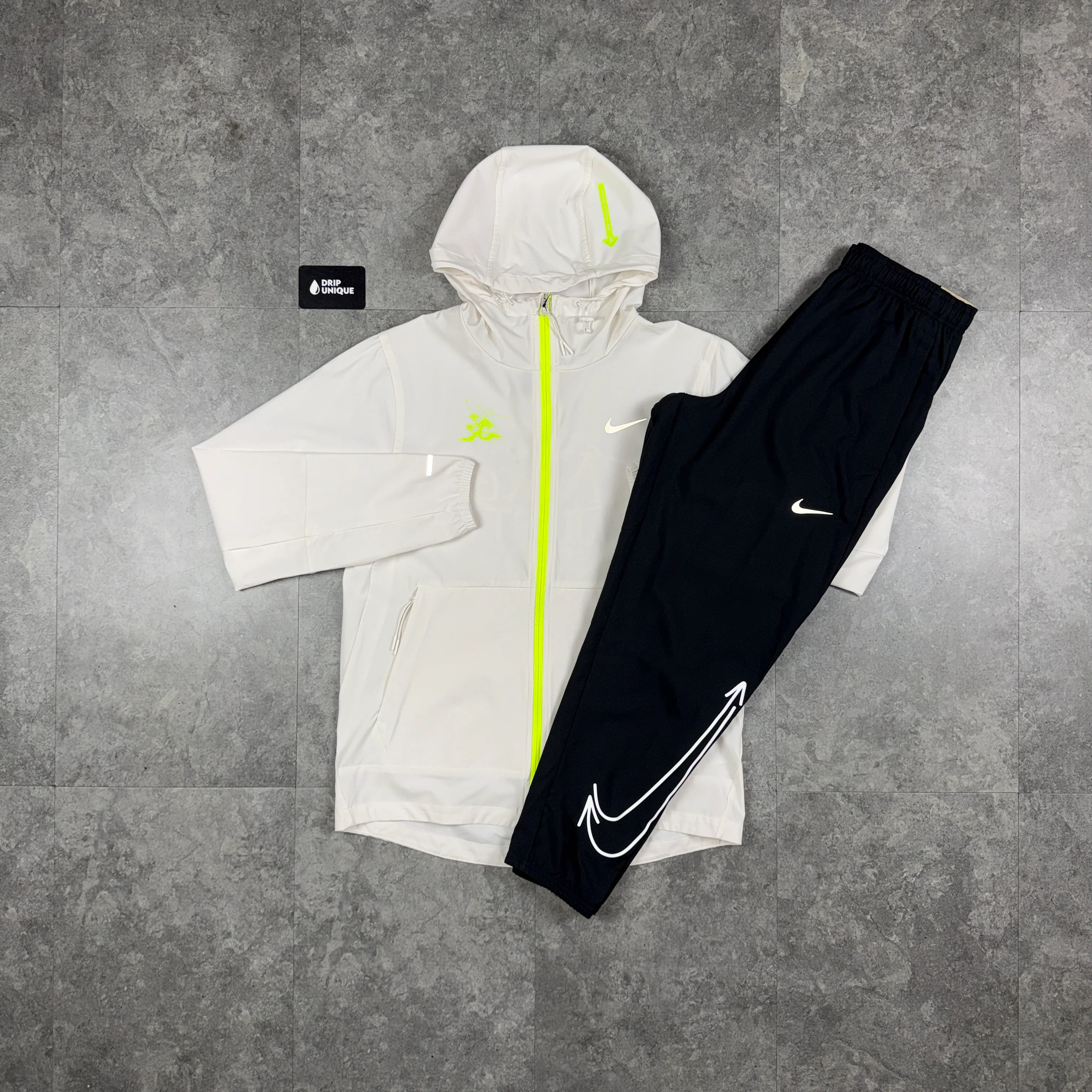 Nike Repel “Just Do It” Windrunner Jacket White & Black Nike “Just Do It” Challenger Pants Set