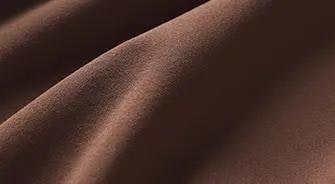 A MODEL POSES WEARING SKIMS SOFT SMOOTHING SEAMLESS