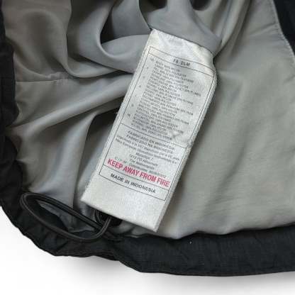 Vintage 90s Rare Down Spellout Pufferjacke Schwarz