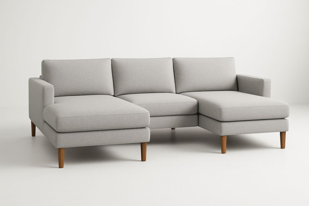 Szürke L-alakú sarokkanapé tömör fa lábakkal, szövet borítással