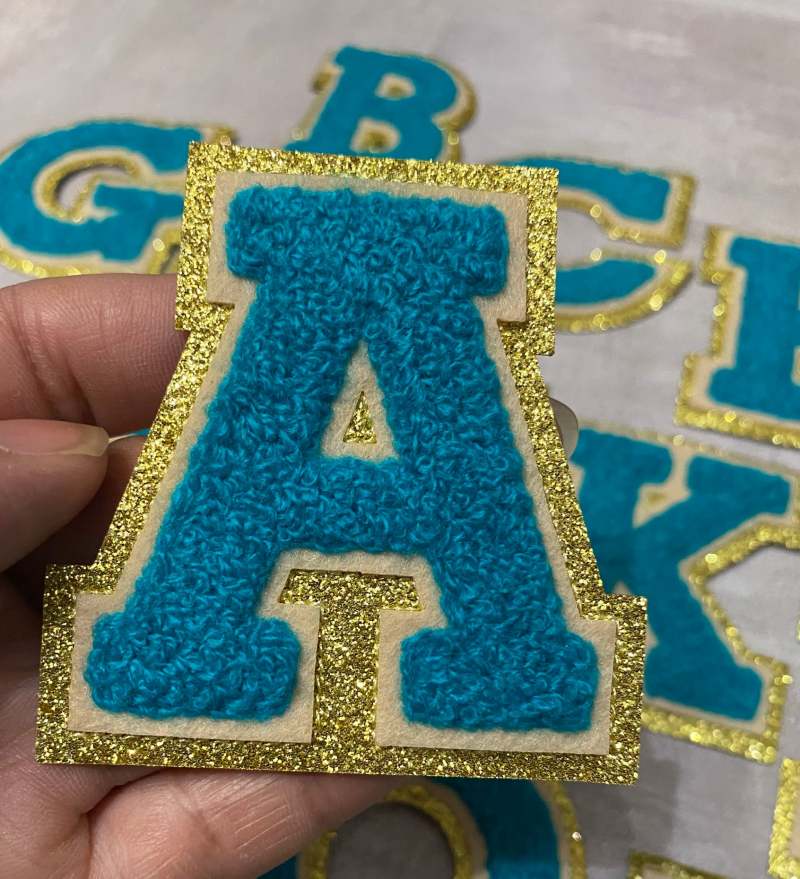 Patch Party Club, (1-pc) Teal & Cream w/ GOLD Glitter Chenille iron-on letters, Size 2.75” OVERSTOCK not all letters available, 10 pcs minimum purchase, For Hats, DIY Crafts, Jackets, Junk Socks, and More (Copy)