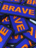 Popular Patch, Blue, Black & Orange|"Brave" Iron-on Embroidered Patch; Statement Patch, Patches for Men, Size 3" x 1.75", Small Jacket Patch