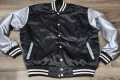 Limited Edition: Satin, Black Body, Gray Arms, White Stripes, Varsity Jacket with Ribbed Cuffs, Interior Zipper, Starter Sports Jacket