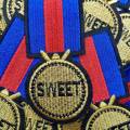 Cool, Ribbon Badge, "Sweet" Red, Blue, Metallic Gold, Patch, Size 4x2", Sew on